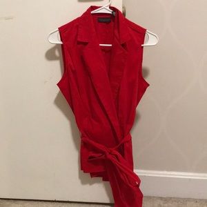 Red sleeveless blouse with bow